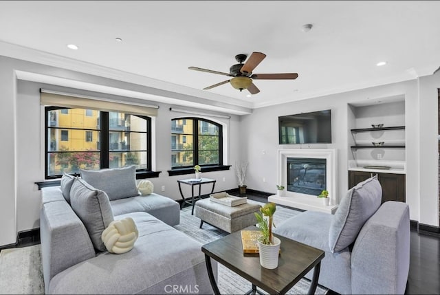 155 Cordova St Unit 203, Pasadena, CA 91105 - living room with ceiling fan, recessed lighting, a glass covered fireplace, crown molding, and built in shelves