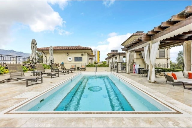 155 Cordova St Unit 203, Pasadena, CA 91105 - community pool with a patio and a mountain view