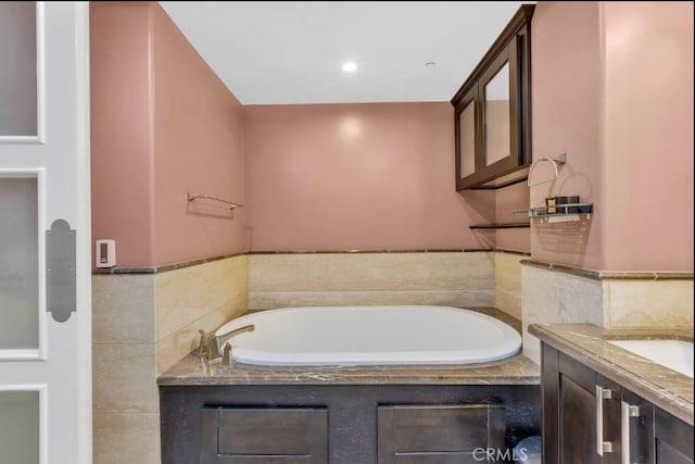 155 Cordova St Unit 203, Pasadena, CA 91105 - full bathroom featuring a garden tub, vanity, and recessed lighting