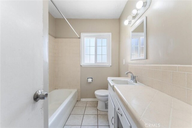 35921 80th St E, Littlerock, CA 93543 - bathroom with vanity, toilet, tile patterned floors, and shower / bathtub combination