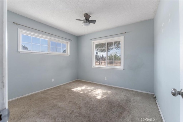 35921 80th St E, Littlerock, CA 93543 - carpeted spare room with healthy amount of natural light, ceiling fan, a textured ceiling, and baseboards