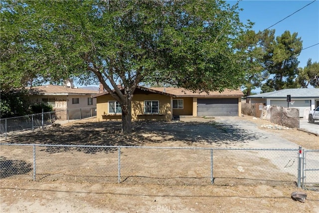 35921 80th St E, Littlerock, CA 93543 - ranch-style house with asphalt driveway, a garage, and stucco siding
