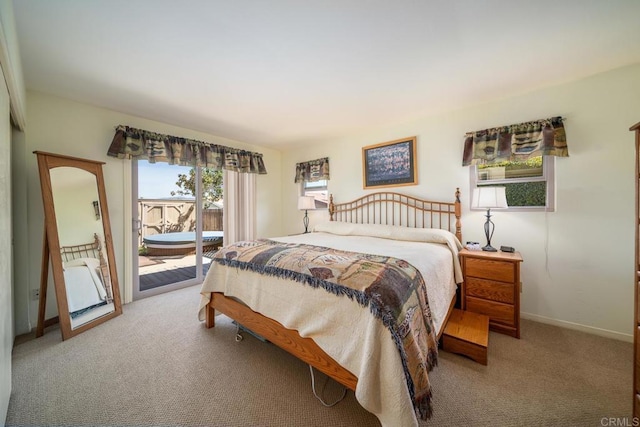 905 Discovery St, San Marcos, CA 92078 - carpeted bedroom with access to exterior and baseboards