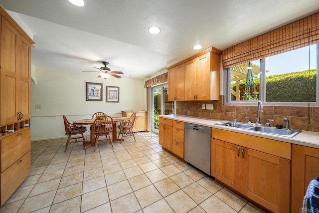 905 Discovery St, San Marcos, CA 92078 - kitchen featuring dishwasher, a sink, light countertops, recessed lighting, and light tile patterned floors