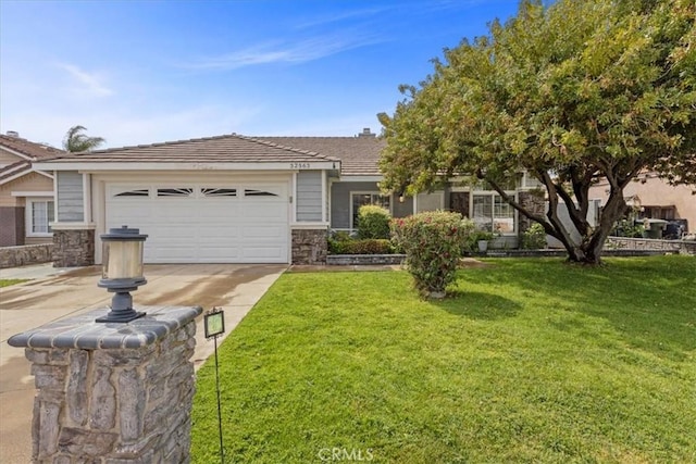 32563 Cedar Spring Ct, Wildomar, CA 92595 - view of front of home featuring driveway, a garage, stone siding, and a front lawn