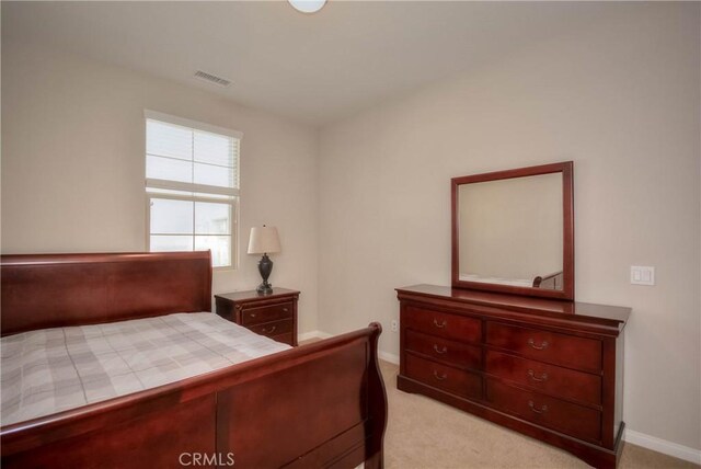 3212 Willow Creek Rd, West Covina, CA 91791 - bedroom featuring light carpet and baseboards