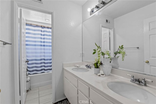 27051 Featherhill Dr, Corona, CA 92883 - bathroom with double vanity, tile patterned floors, and shower / tub combo with curtain