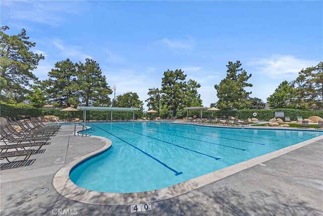 27051 Featherhill Dr, Corona, CA 92883 - community pool featuring a patio area