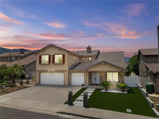27051 Featherhill Dr, Corona, CA 92883 - view of front of house with a garage, concrete driveway, stucco siding, and covered porch
