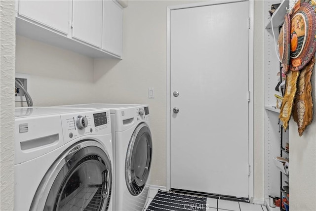 27051 Featherhill Dr, Corona, CA 92883 - washroom with cabinet space, washer and clothes dryer, and tile patterned floors