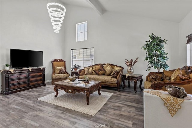 27051 Featherhill Dr, Corona, CA 92883 - living room with wood finished floors, beam ceiling, a chandelier, and high vaulted ceiling