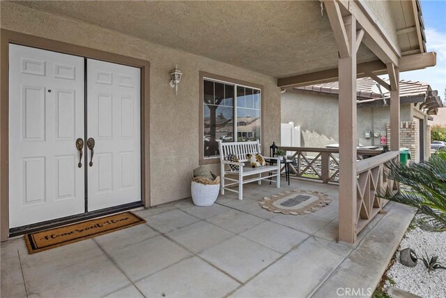 27051 Featherhill Dr, Corona, CA 92883 - entrance to property featuring stucco siding