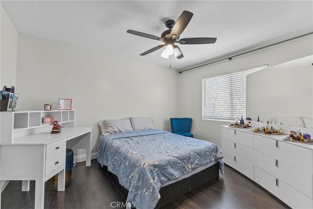 27051 Featherhill Dr, Corona, CA 92883 - bedroom with dark wood-style flooring, ceiling fan, and baseboards