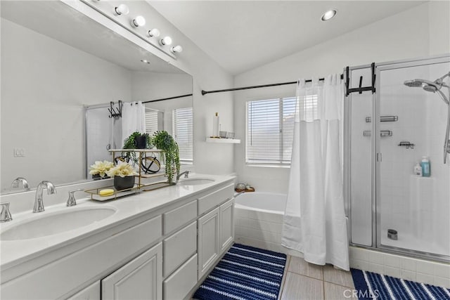 27051 Featherhill Dr, Corona, CA 92883 - full bath featuring a stall shower, vaulted ceiling, double vanity, a bath, and tile patterned floors