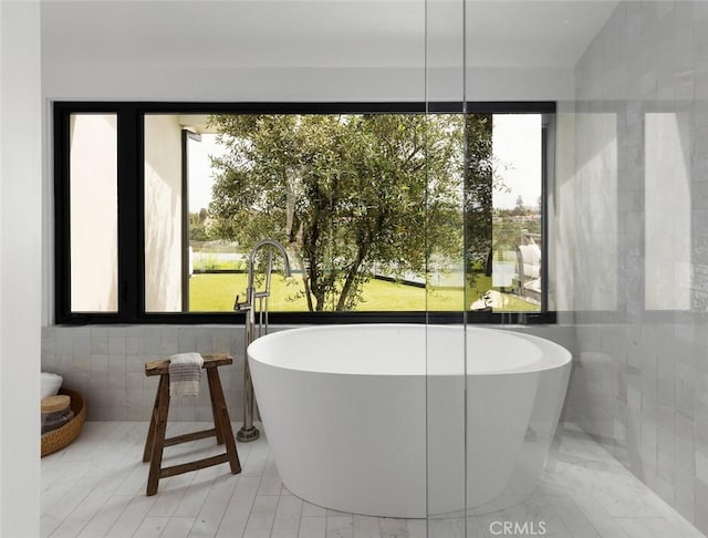 1936 Galaxy Dr, Newport Beach, CA 92660 - full bathroom featuring tile walls and a freestanding tub