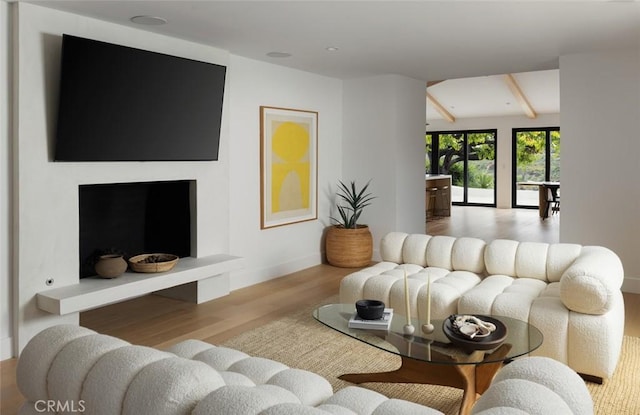 1936 Galaxy Dr, Newport Beach, CA 92660 - living room featuring wood finished floors, baseboards, and beamed ceiling