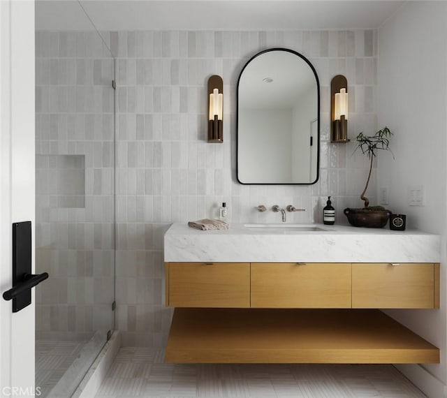 1936 Galaxy Dr, Newport Beach, CA 92660 - full bath featuring vanity, a stall shower, tasteful backsplash, and tile walls
