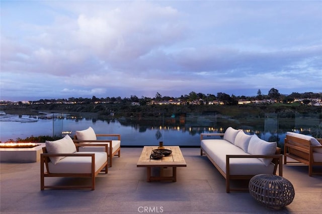 1936 Galaxy Dr, Newport Beach, CA 92660 - view of patio / terrace with an outdoor living space with a fire pit and a water view