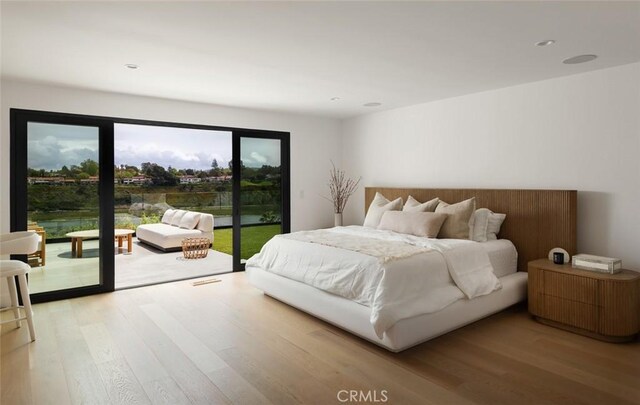 1936 Galaxy Dr, Newport Beach, CA 92660 - bedroom featuring access to outside, light wood-style flooring, and recessed lighting