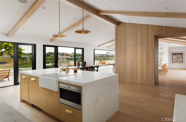1936 Galaxy Dr, Newport Beach, CA 92660 - kitchen with a sink, light wood-style floors, pendant lighting, and plenty of natural light