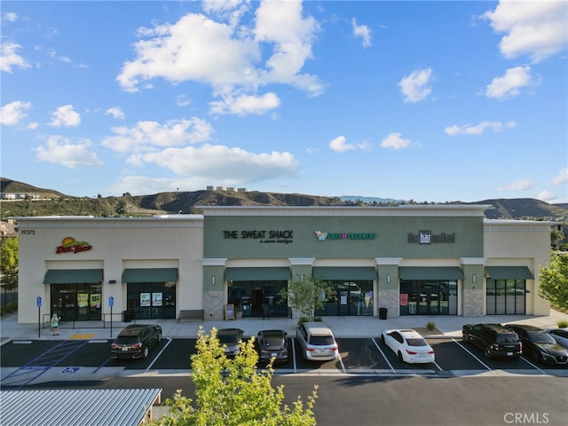 19539 Laroda, Saugus, CA 91350 - view of commercial location with uncovered parking and a mountain view