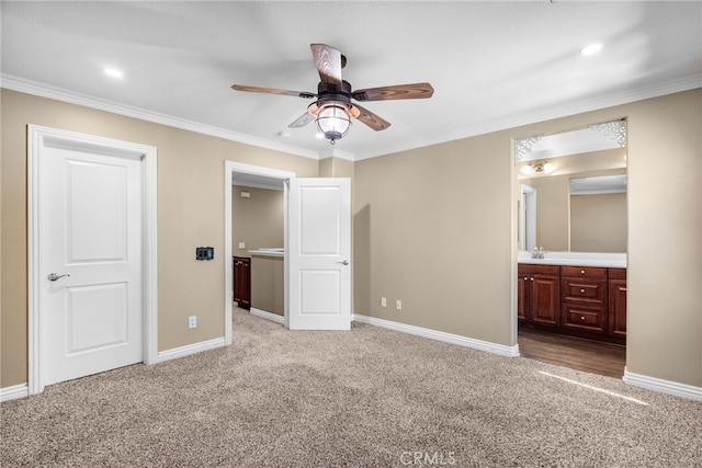 19539 Laroda, Saugus, CA 91350 - unfurnished bedroom featuring light carpet, baseboards, crown molding, connected bathroom, and a sink