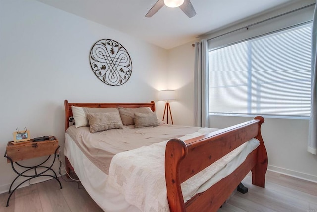 35140 Bergamot, Fallbrook, CA 92028 - bedroom featuring wood finished floors, multiple windows, and ceiling fan