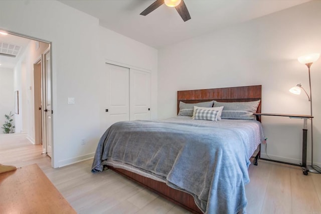 35140 Bergamot, Fallbrook, CA 92028 - bedroom featuring light wood finished floors, a closet, and a ceiling fan