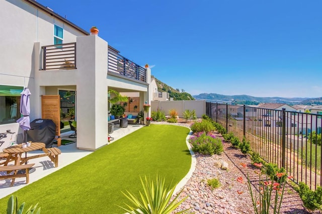 35140 Bergamot, Fallbrook, CA 92028 - fenced backyard featuring a balcony, a mountain view, a patio, and an outdoor living space