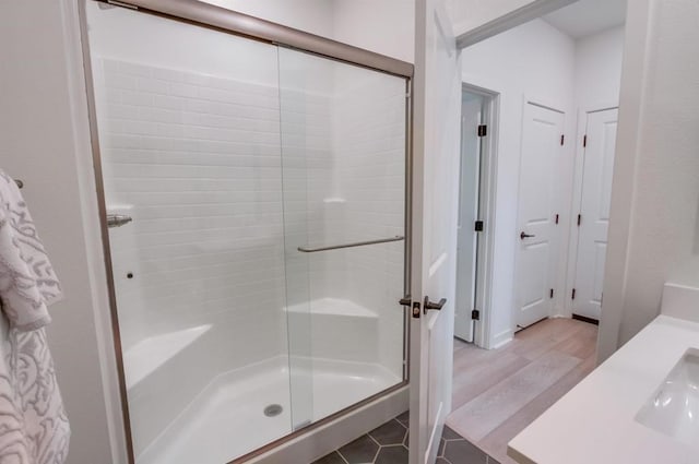 35140 Bergamot, Fallbrook, CA 92028 - bathroom with a shower stall, vanity, and tile patterned floors
