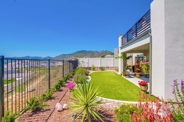 35140 Bergamot, Fallbrook, CA 92028 - fenced backyard featuring a mountain view and a patio area
