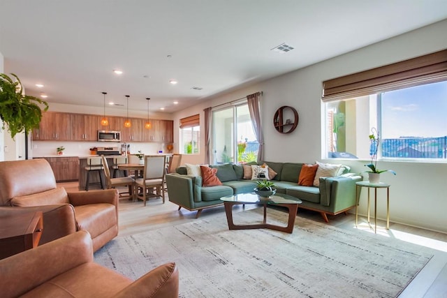 35140 Bergamot, Fallbrook, CA 92028 - living area with light wood-style flooring and recessed lighting
