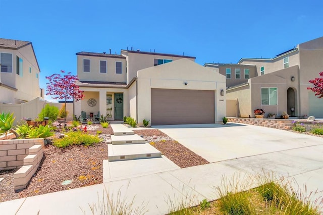 35140 Bergamot, Fallbrook, CA 92028 - view of front of home with stucco siding, a garage, and concrete driveway