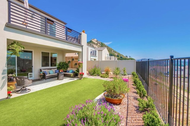 35140 Bergamot, Fallbrook, CA 92028 - fenced backyard featuring an outdoor living space, a patio area, and a balcony