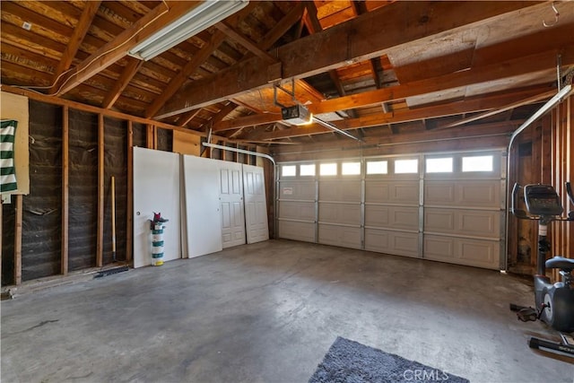2433 N Knoll Ave, Fresno, CA 93722 - garage with a garage door opener