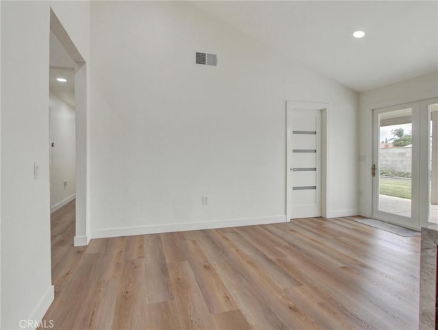 436 Cheyenne Pl, Placentia, CA 92870 - spare room with lofted ceiling, french doors, light wood finished floors, baseboards, and recessed lighting