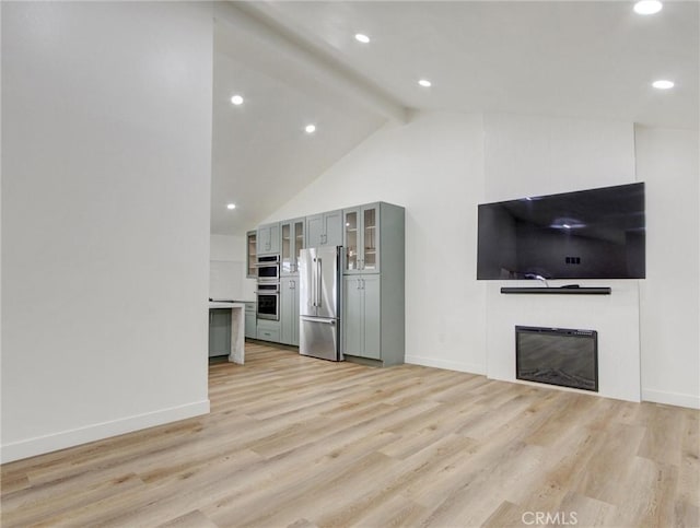436 Cheyenne Pl, Placentia, CA 92870 - unfurnished living room featuring a glass covered fireplace, light wood-type flooring, baseboards, and recessed lighting