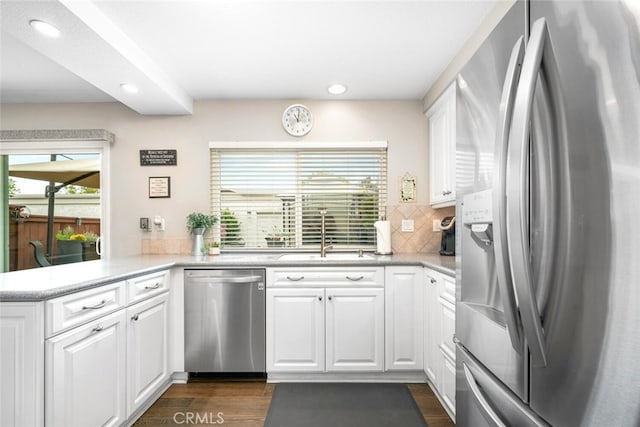 6898 Breton Way, Cypress, CA 90630 - kitchen with appliances with stainless steel finishes, a sink, recessed lighting, white cabinetry, and tasteful backsplash