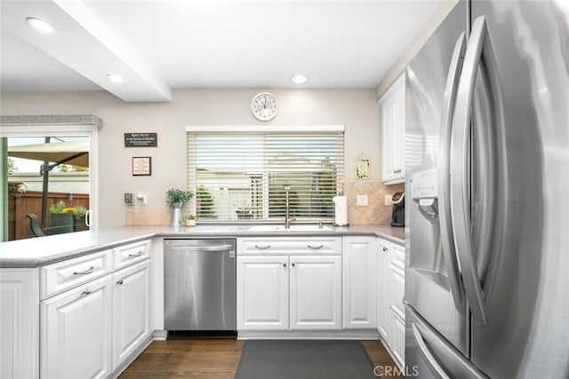 6898 Breton Way, Cypress, CA 90630 - kitchen featuring stainless steel appliances, recessed lighting, white cabinets, tasteful backsplash, and light countertops