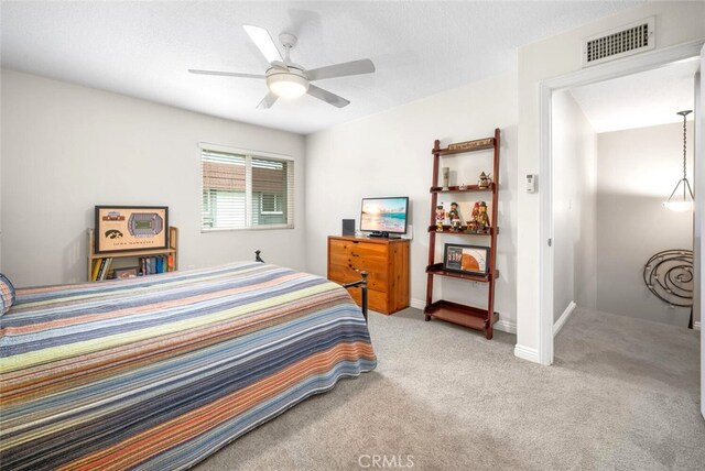 6898 Breton Way, Cypress, CA 90630 - bedroom with light carpet, baseboards, and ceiling fan
