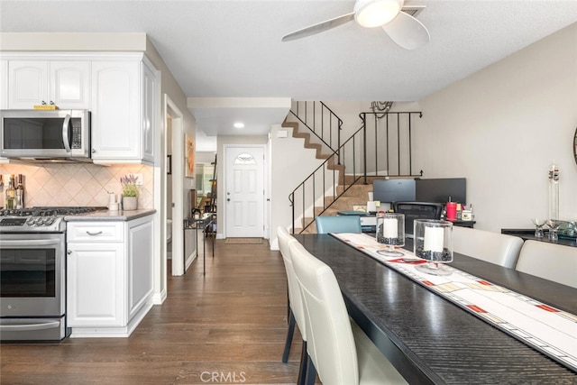 6898 Breton Way, Cypress, CA 90630 - dining room featuring stairway, dark wood-style flooring, ceiling fan, and recessed lighting