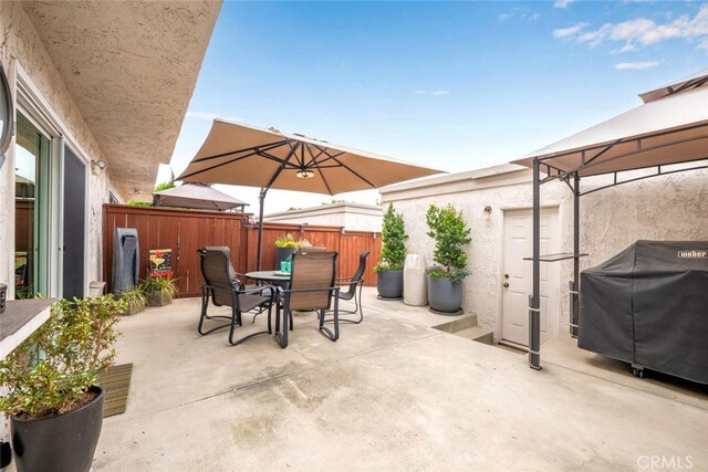 6898 Breton Way, Cypress, CA 90630 - fenced backyard featuring outdoor dining space, a patio, area for grilling, and a gazebo