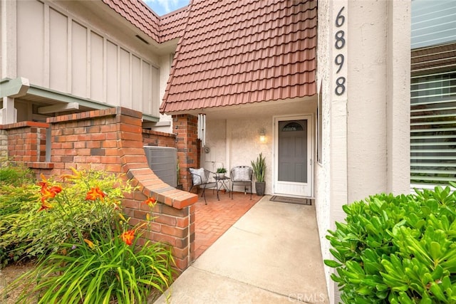 6898 Breton Way, Cypress, CA 90630 - doorway to property with a tile roof and stucco siding