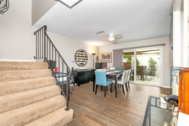 6898 Breton Way, Cypress, CA 90630 - dining room featuring stairs, a ceiling fan, wood finished floors, and baseboards