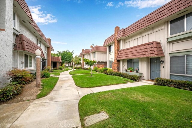 6898 Breton Way, Cypress, CA 90630 - view of community featuring a residential view and a yard