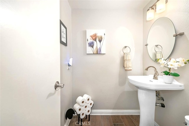 6898 Breton Way, Cypress, CA 90630 - half bathroom with baseboards and wood finished floors