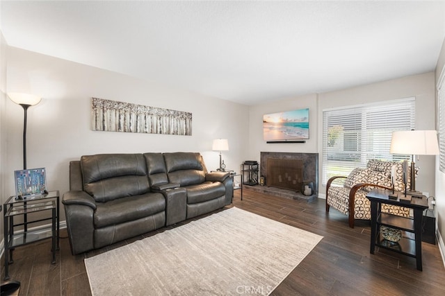 6898 Breton Way, Cypress, CA 90630 - living room with dark wood-style floors and a fireplace with raised hearth