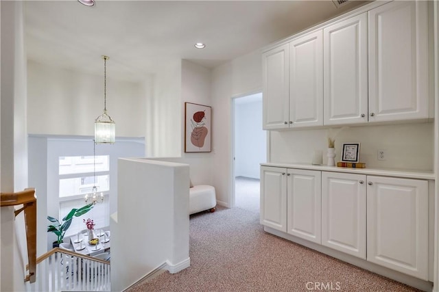 30 Oakhurst Rd, Irvine, CA 92620 - corridor featuring light carpet, recessed lighting, and a chandelier