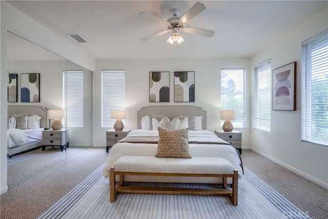 30 Oakhurst Rd, Irvine, CA 92620 - bedroom featuring multiple windows, baseboards, and light colored carpet