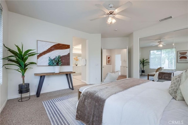 30 Oakhurst Rd, Irvine, CA 92620 - bedroom featuring carpet, baseboards, ceiling fan, and ensuite bath
